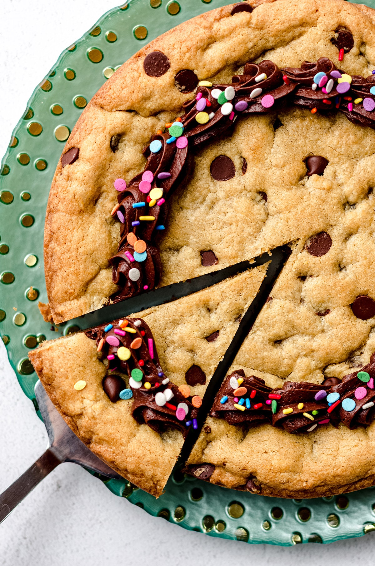 aerial photo of sliced chocolate chip cookie cake