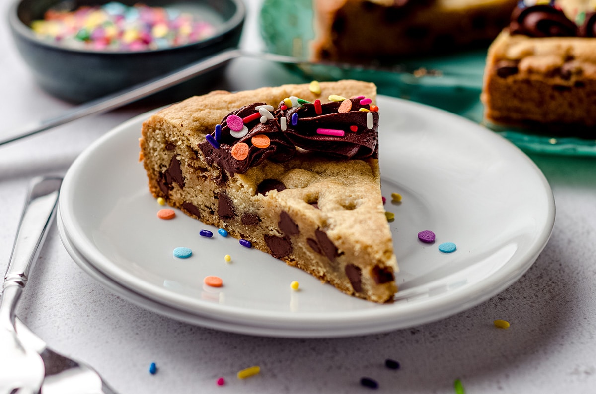 slice of chocolate chip cookie cake on a plate