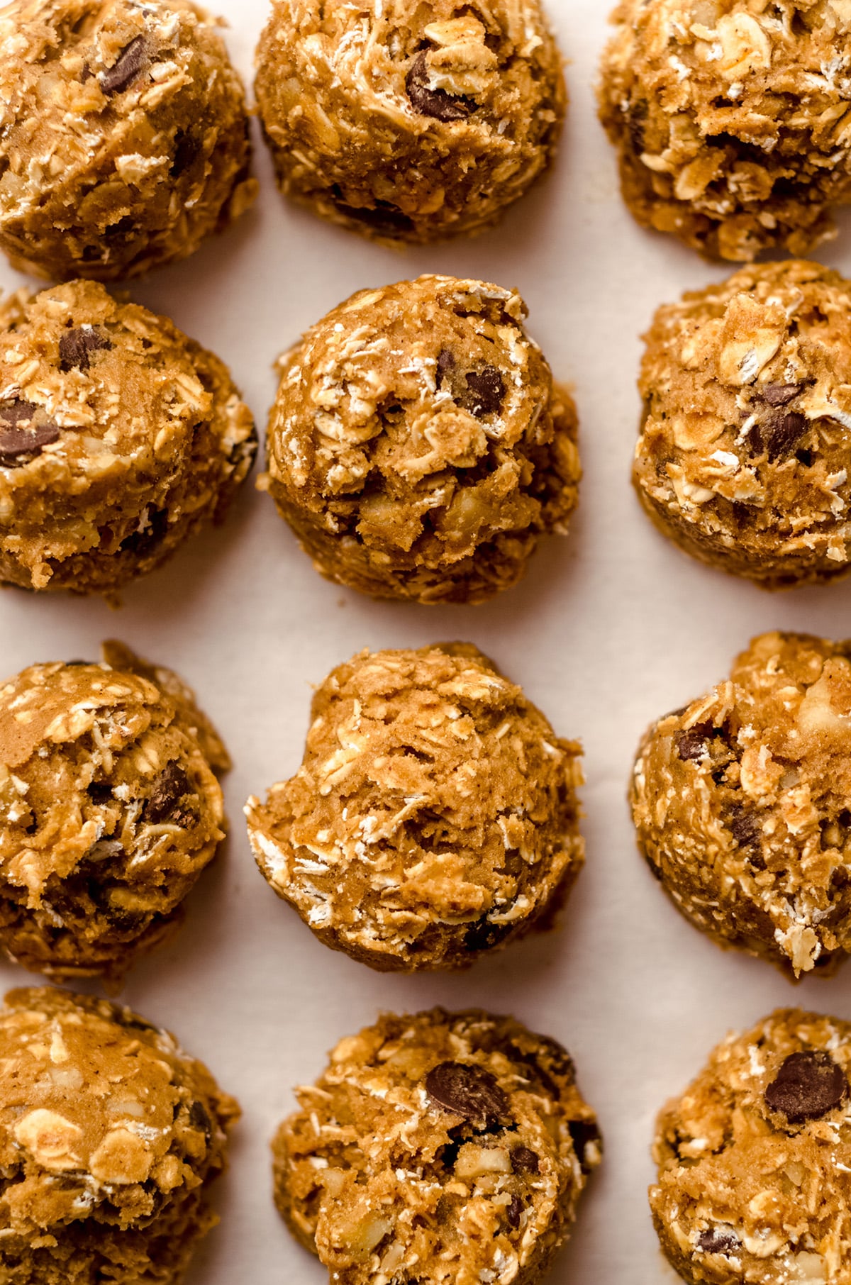 balls of oatmeal chocolate chip walnut cookie dough