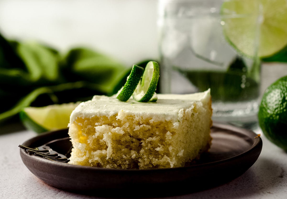 slice of gin and tonic cake sitting on a plate