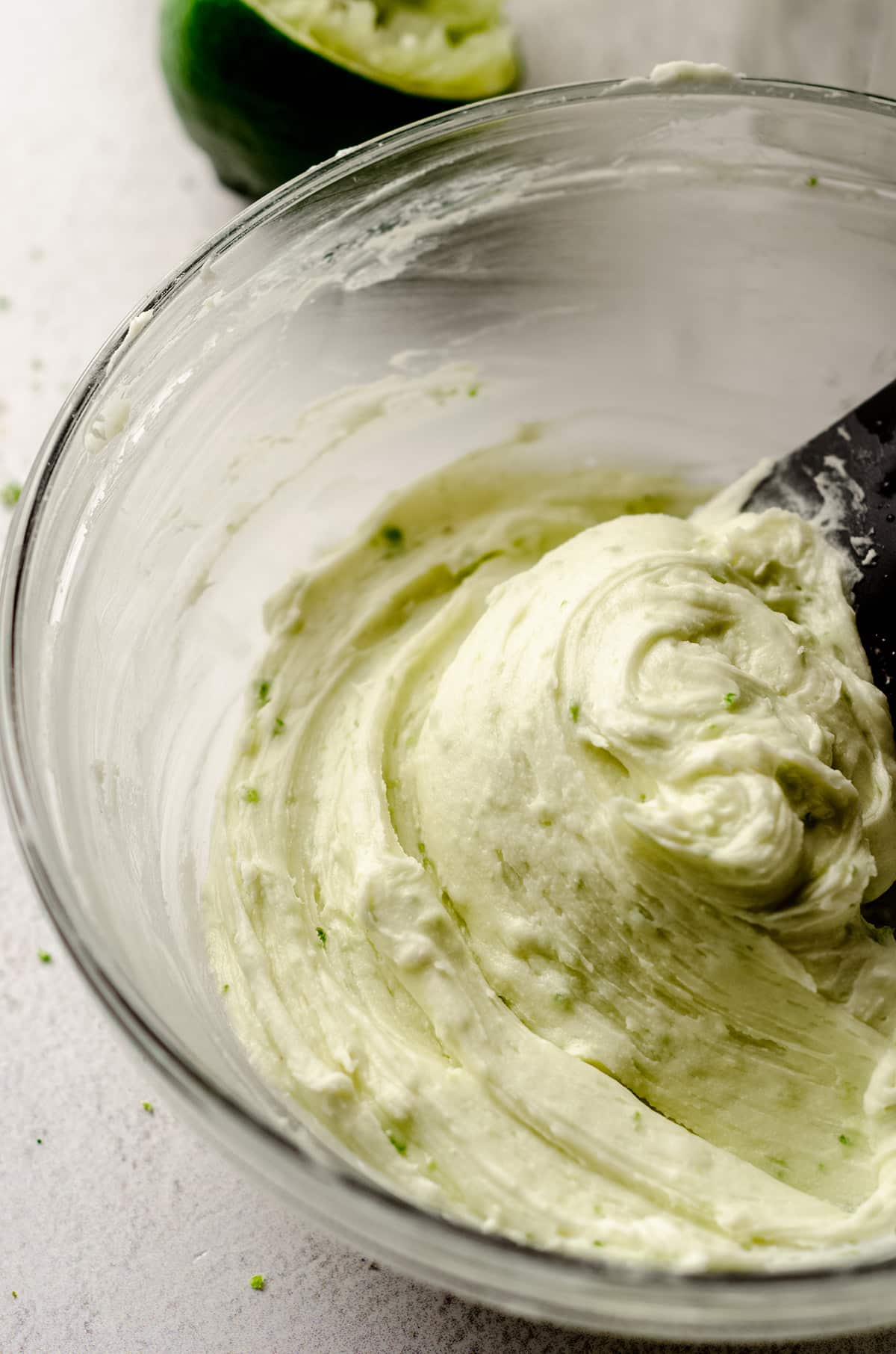 gin lime frosting in a glass bowl
