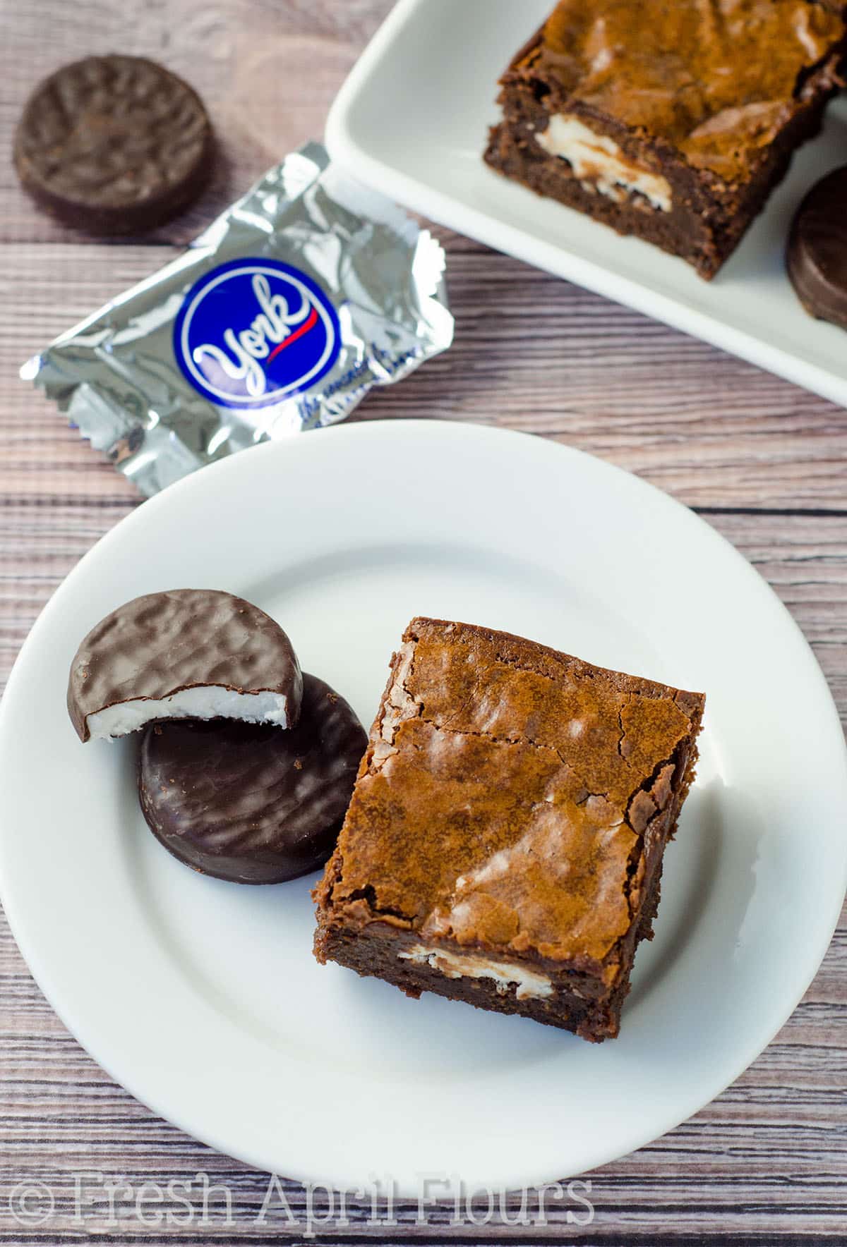 Peppermint Pattie stuffed brownies on a plate.