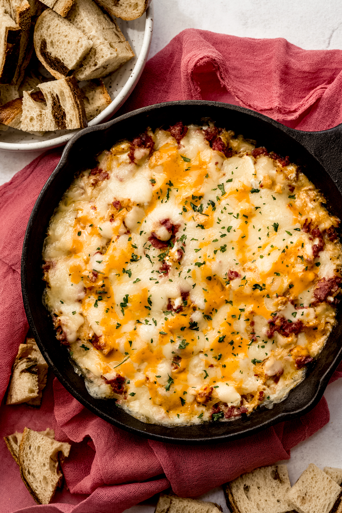 Aerial photo of a skillet of Reuben dip.