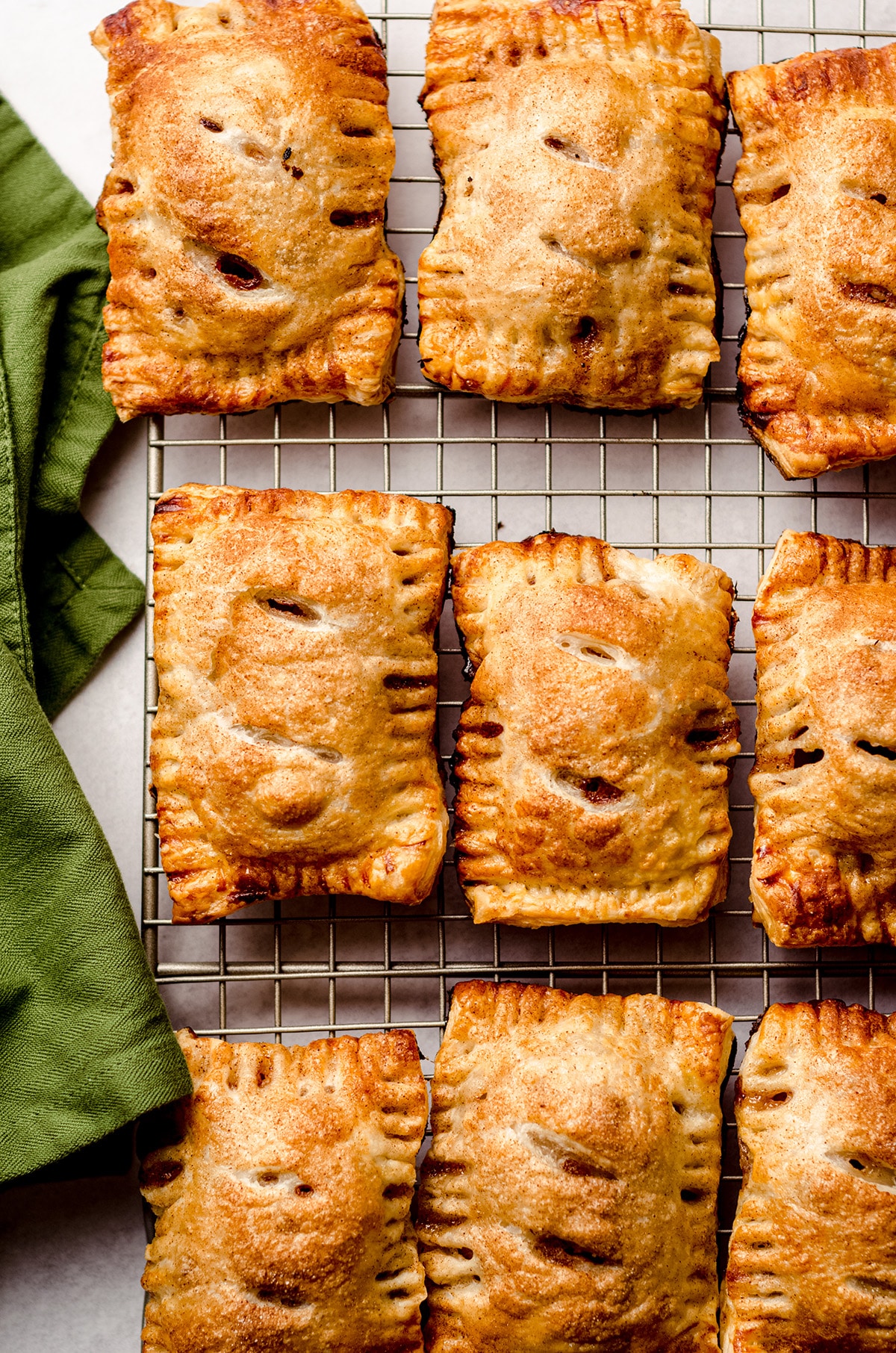 apple hand pies on a wire cooling rack