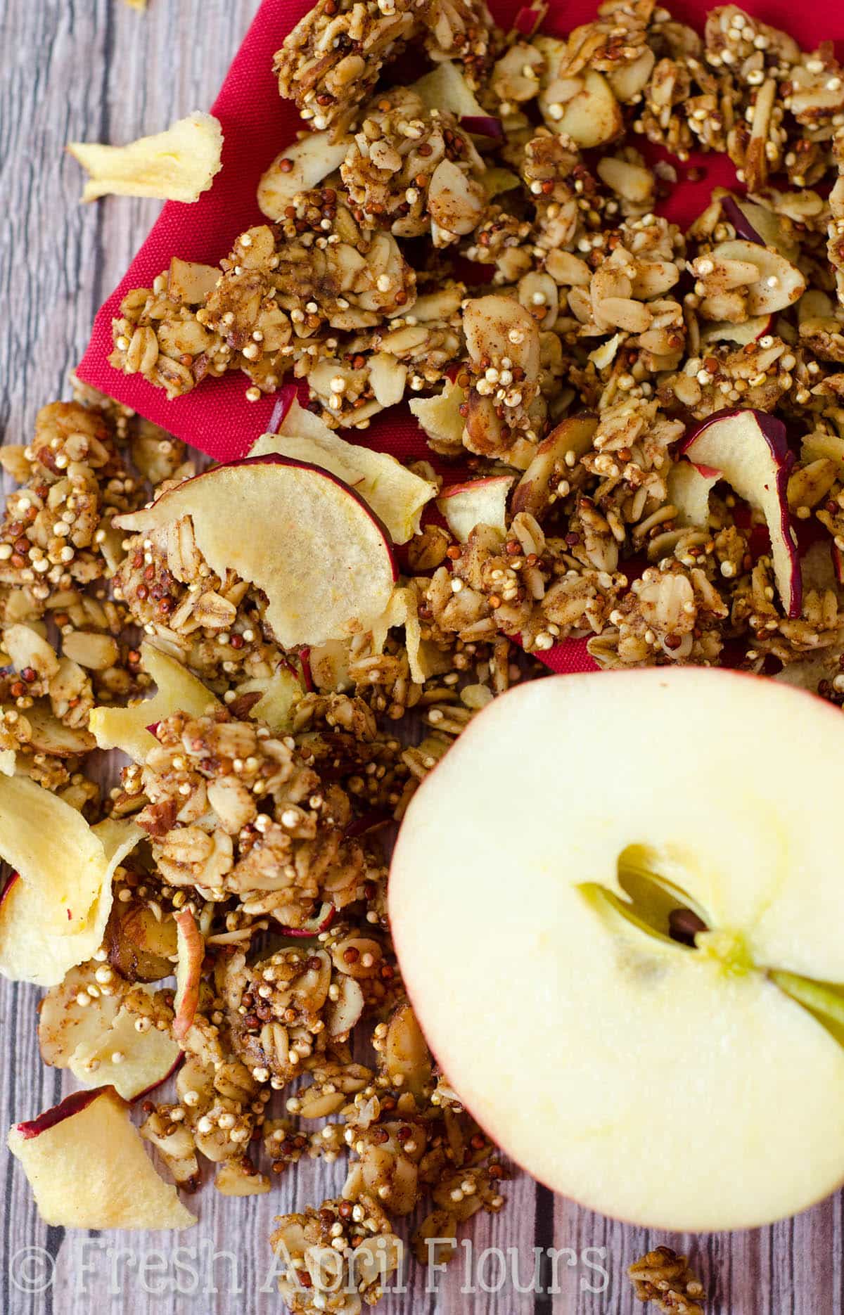 Apple Quinoa Granola: Easy granola spiced with cinnamon, nutmeg, and cloves and bursting with apple flavor. A must-have fall treat!