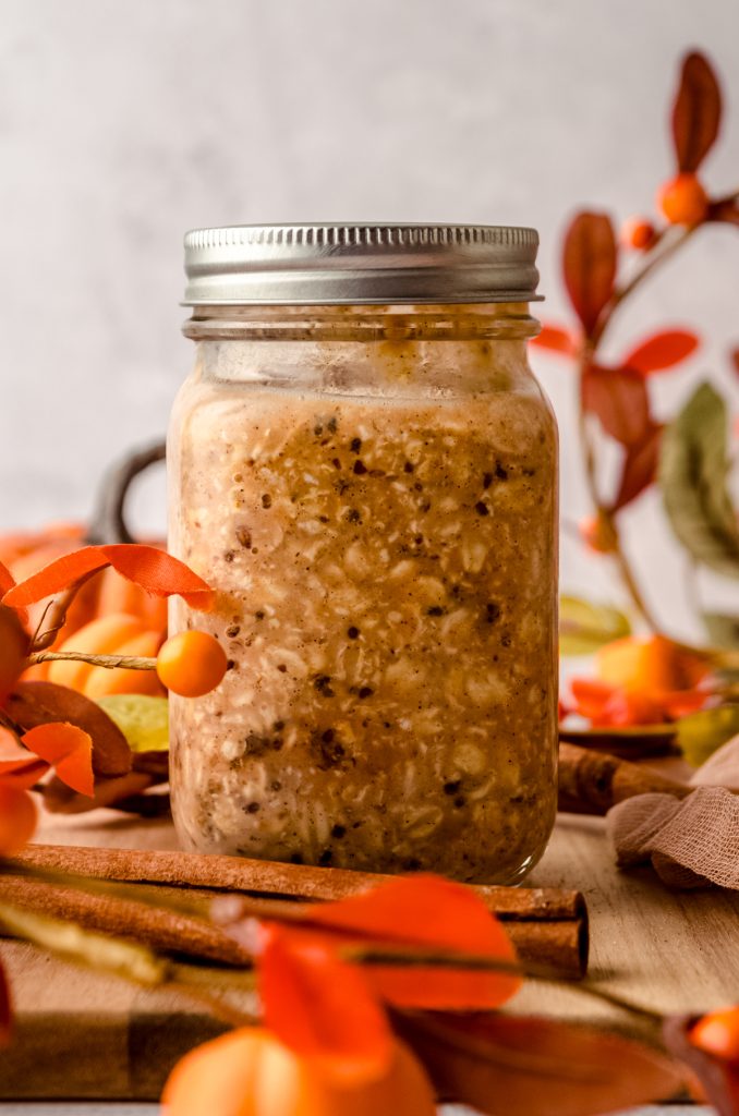 A Mason jar of pumpkin overnight oats.