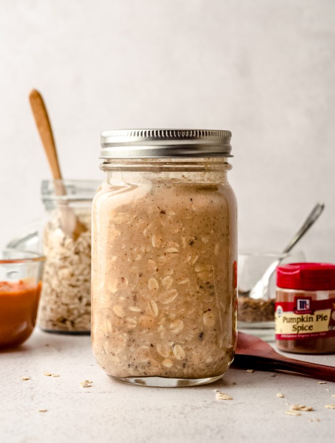 A Mason jar of pumpkin overnight oats.