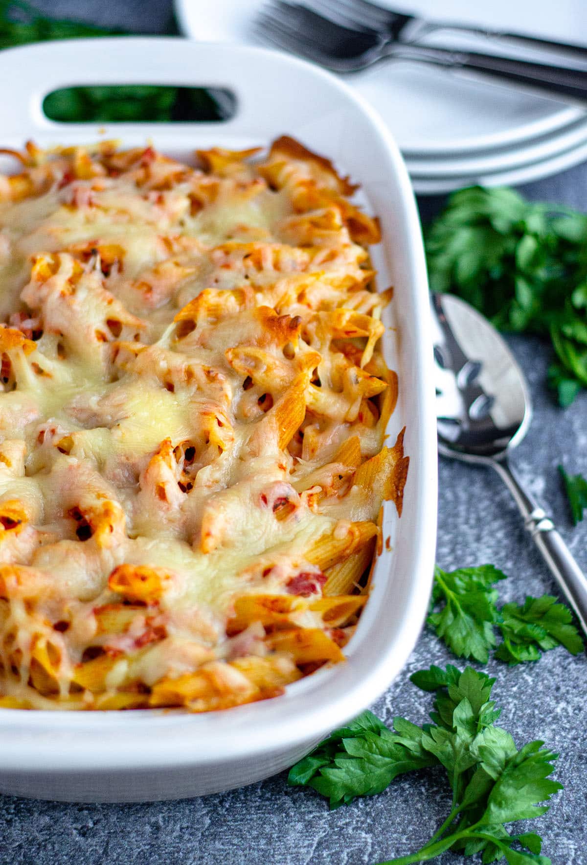baked ziti in a baking dish ready to serve