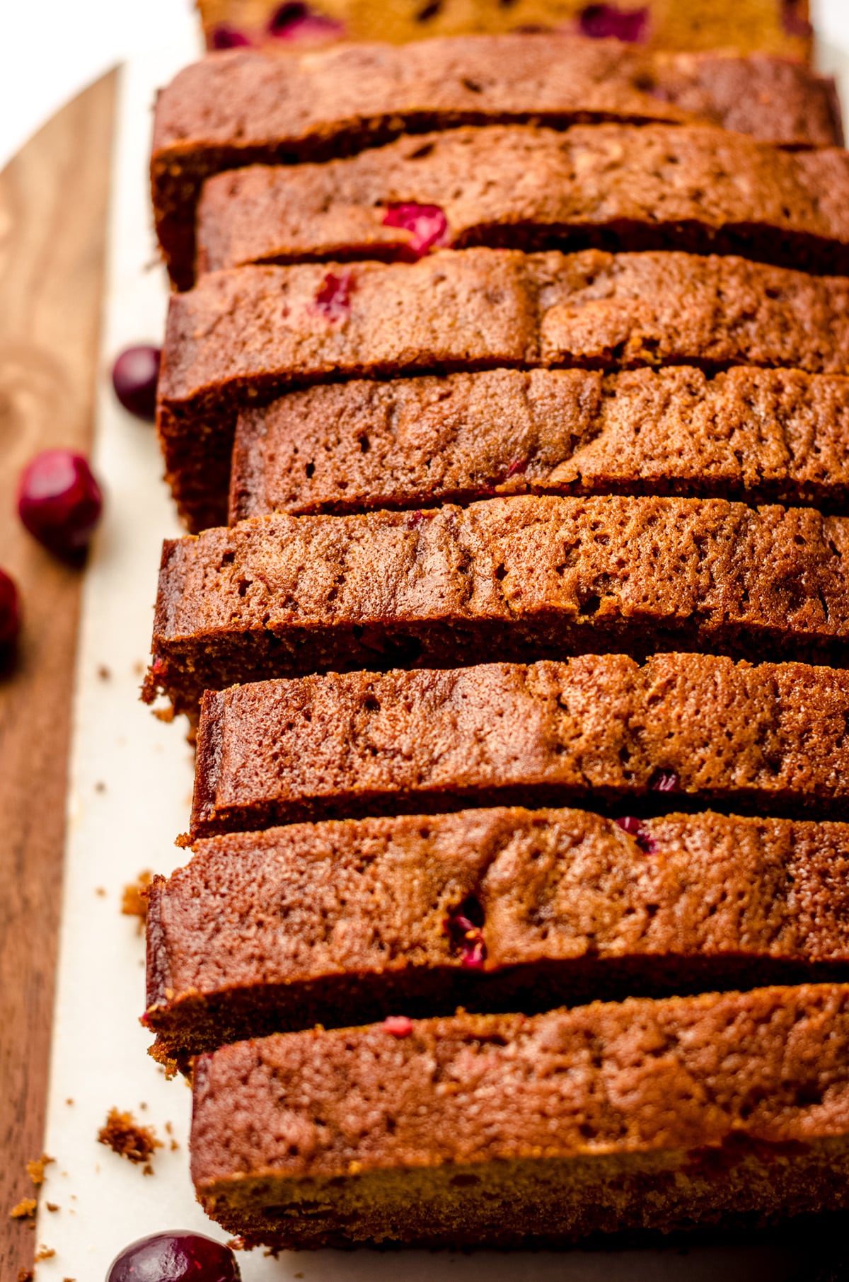 a loaf of cranberry gingerbread cut into slices