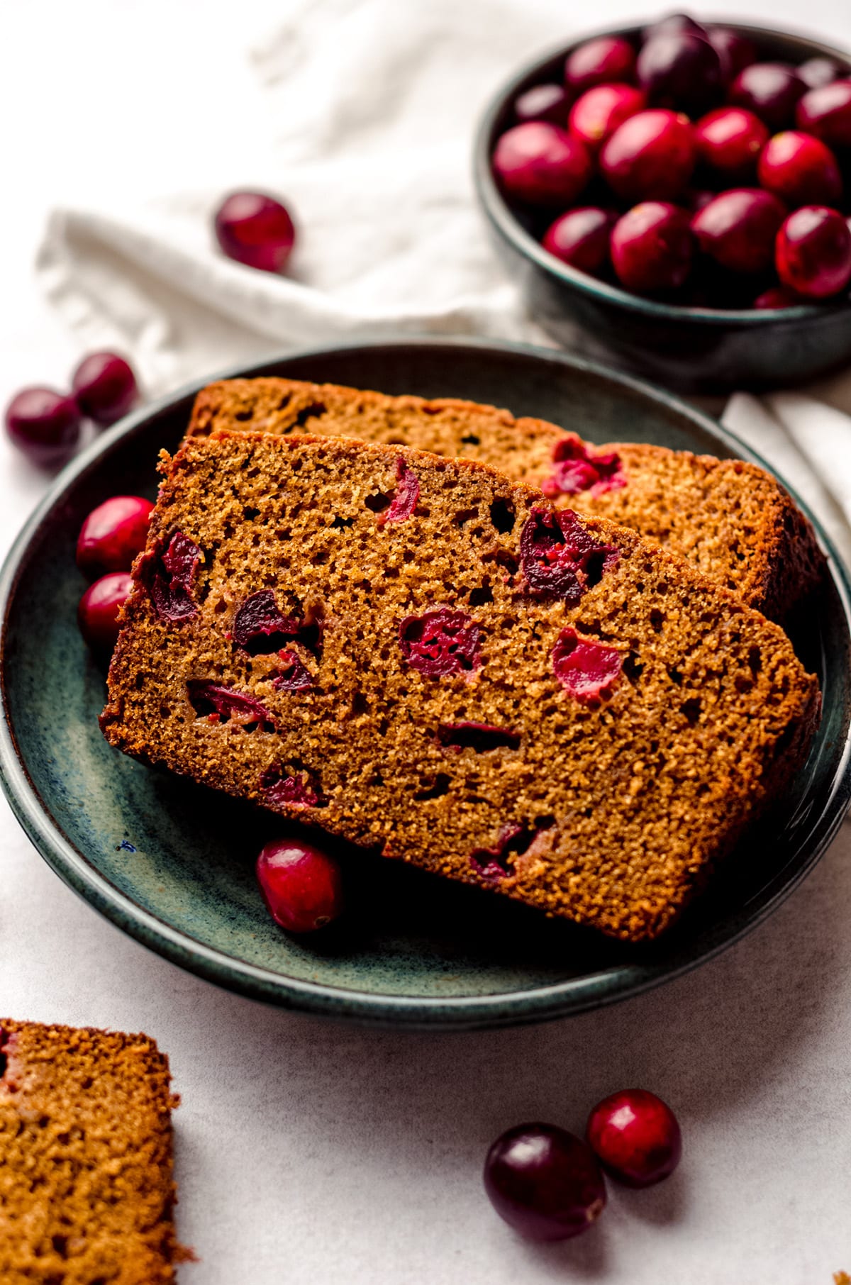 slices of cranberry gingerbread on a plate