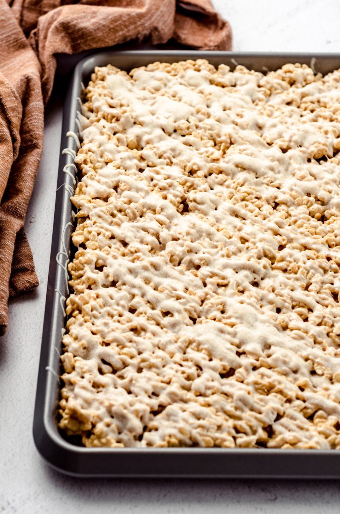 Gingerbread Rice Krispies treats in a baking tray.