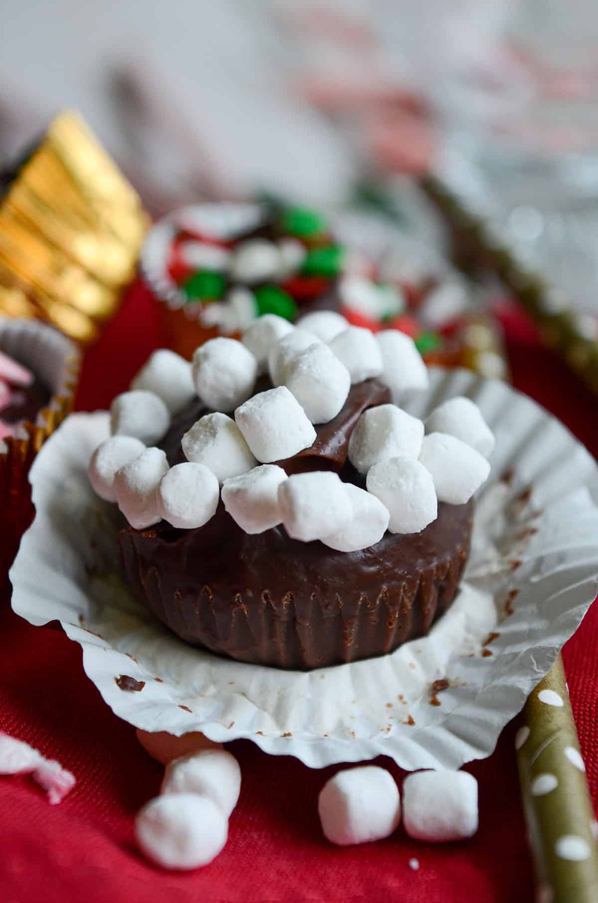 unwrapped hot chocolate bomb sitting in wrapper ready to use