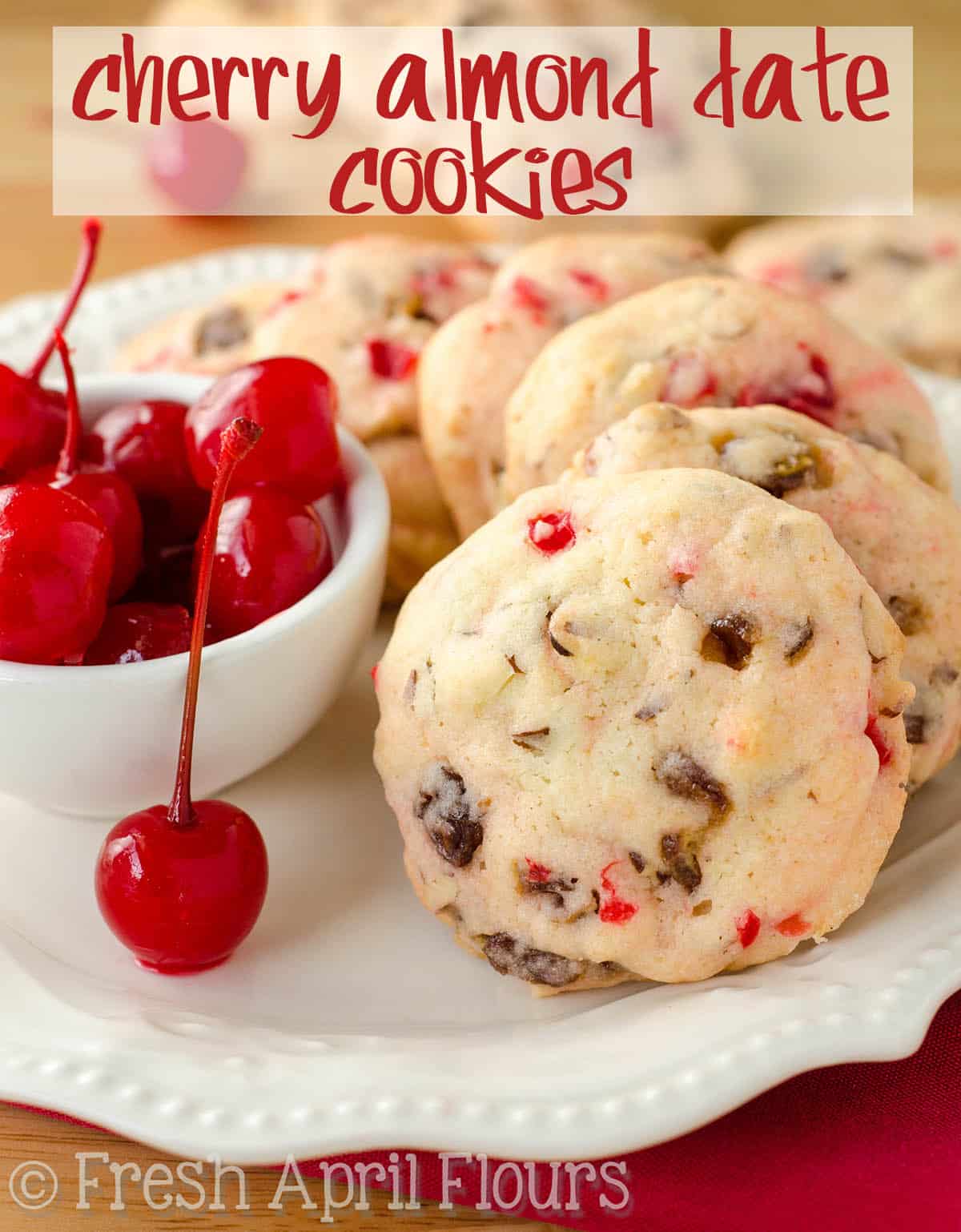 Cherry Almond Date Cookies: Soft-centered cookies filled with crunchy slivered almonds, sweet maraschino cherries, and chewy, flavorful dates. Perfect for your cookie jar any time of the year! via @frshaprilflours
