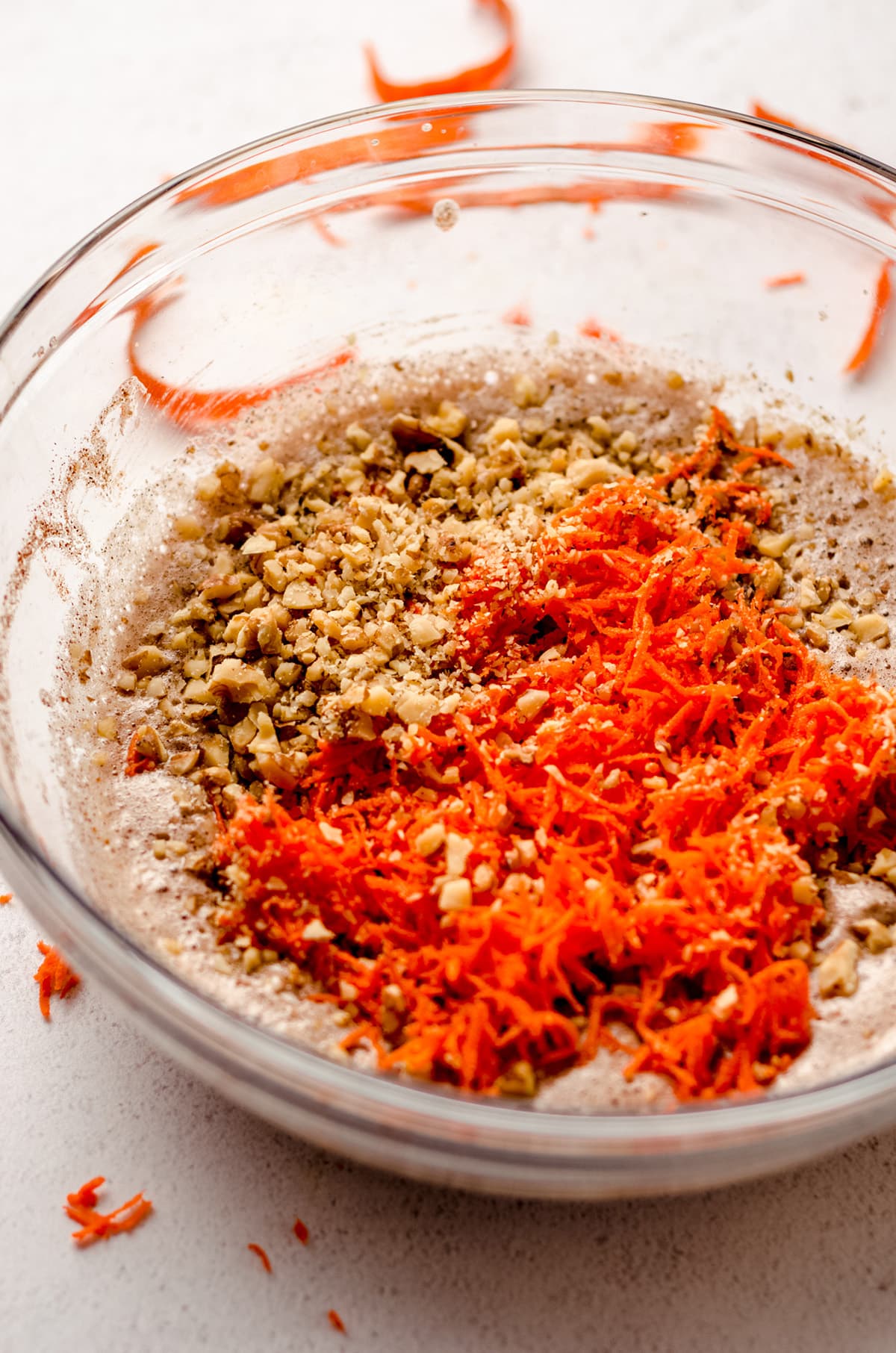 carrot cake macaroon ingredients in a glass bowl