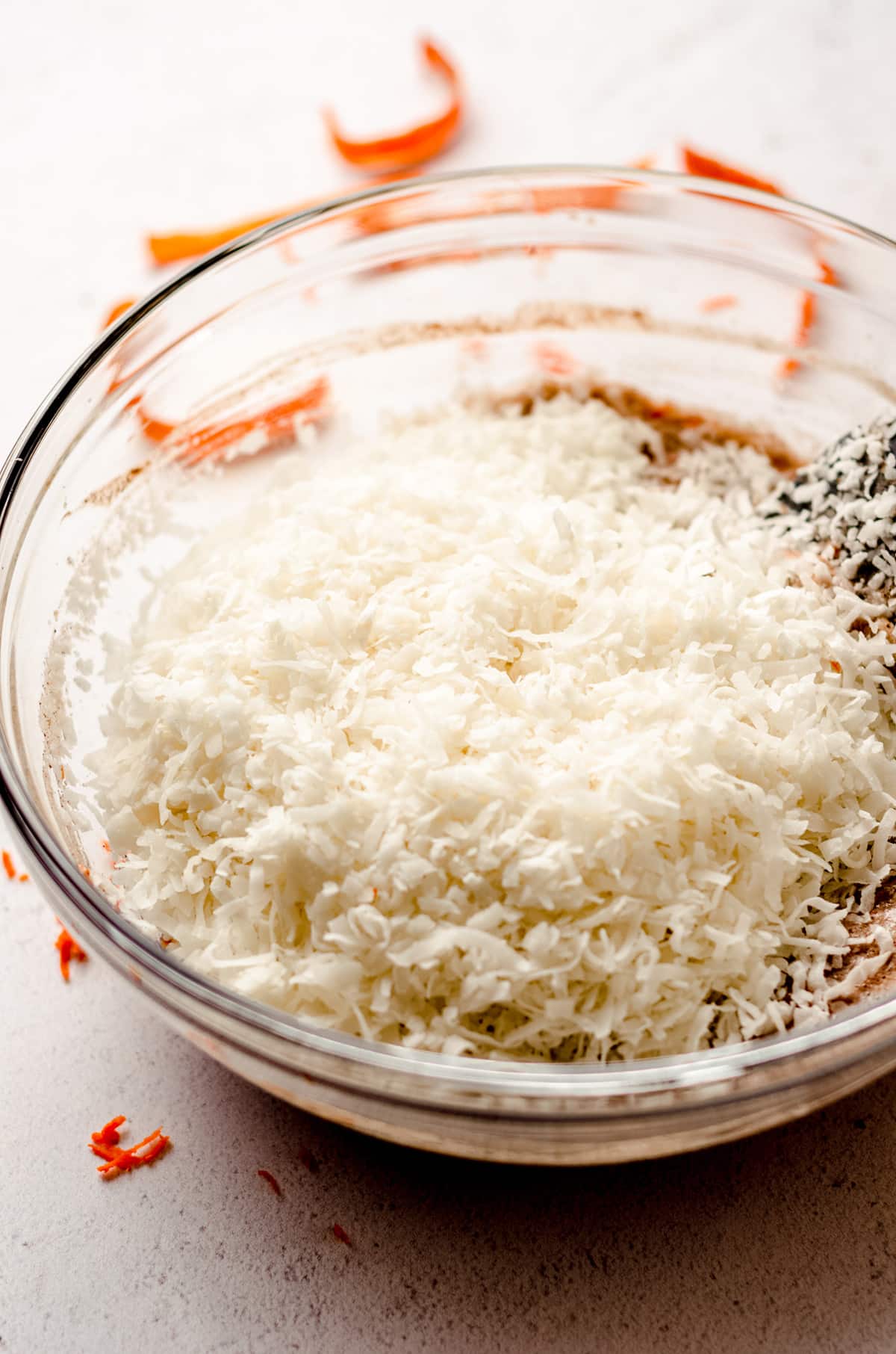 carrot cake macaroon ingredients in a glass bowl