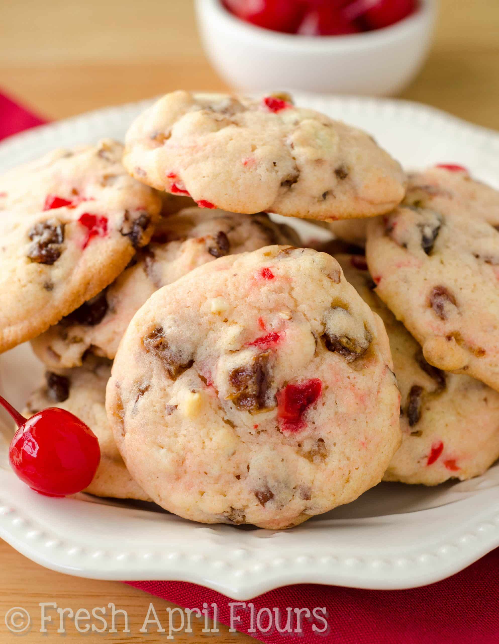 Cherry almond date cookies on a plate.