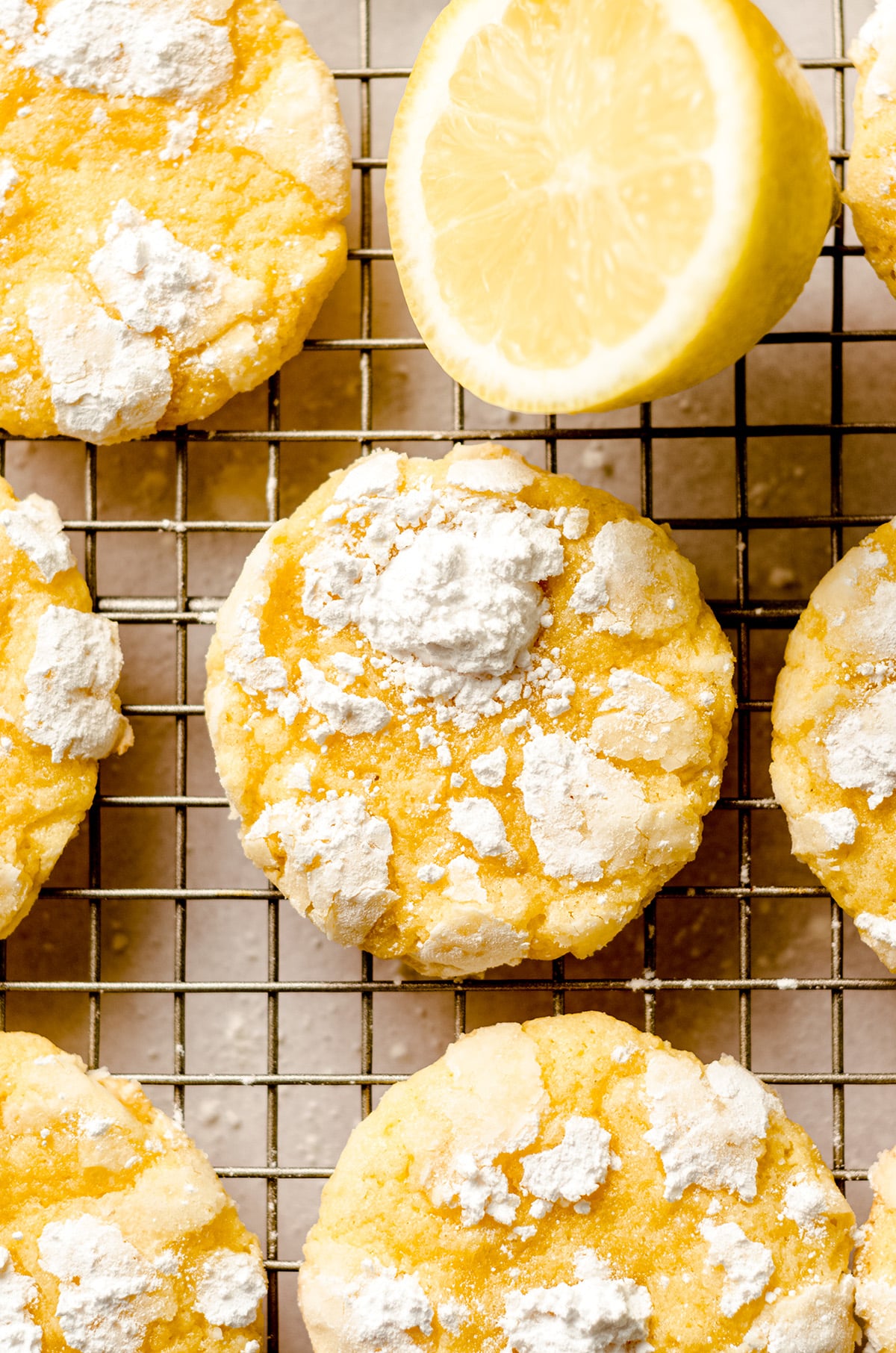 lemon crinkle cookies on a cooling rack