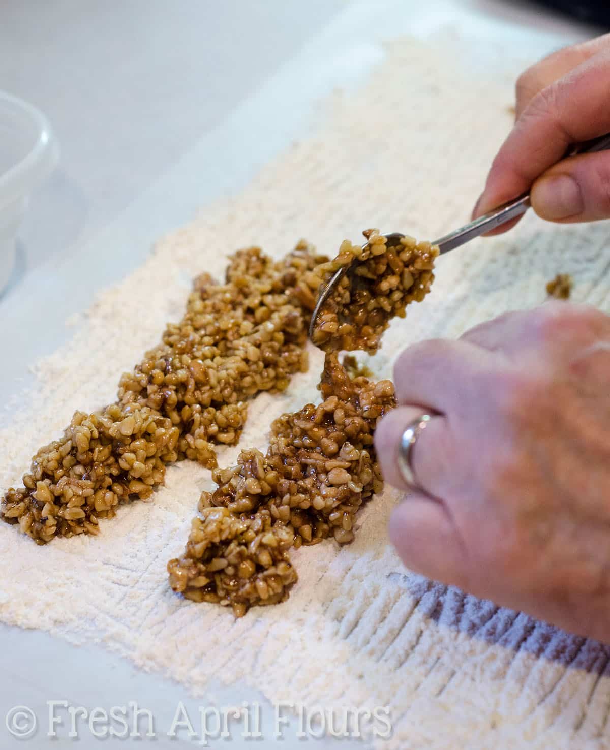 preparing filling for honey walnut cookie sticks