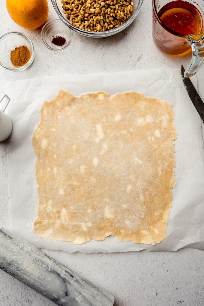 Aerial photo of a square of pie dough.