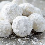 Russian Tea Cakes (Snowballs): Buttery, melt-in-your-mouth shortbread cookies filled with nuts and rolled in powdered sugar. A classic cookie at Christmas time!