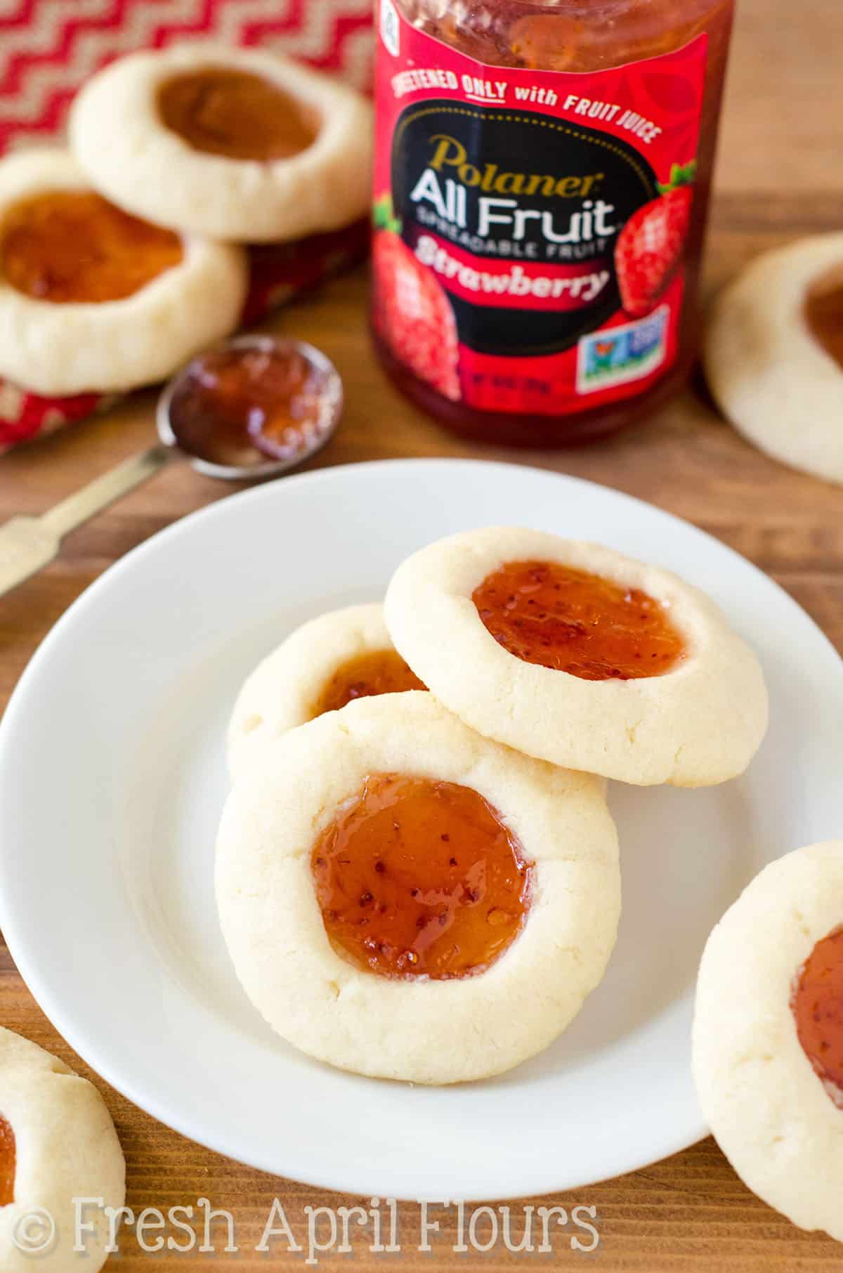 Thumbprint cookies on a plate.