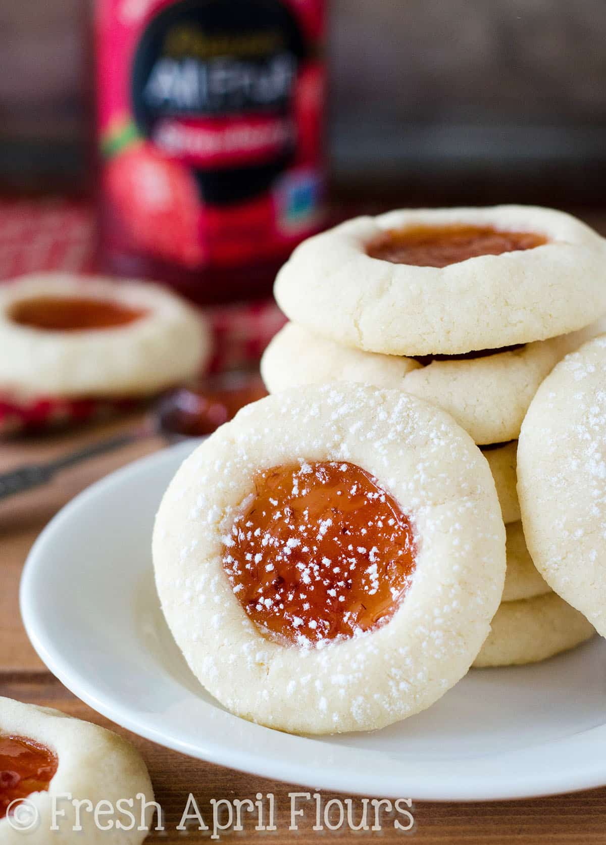 Thumbprint cookies on a plate.