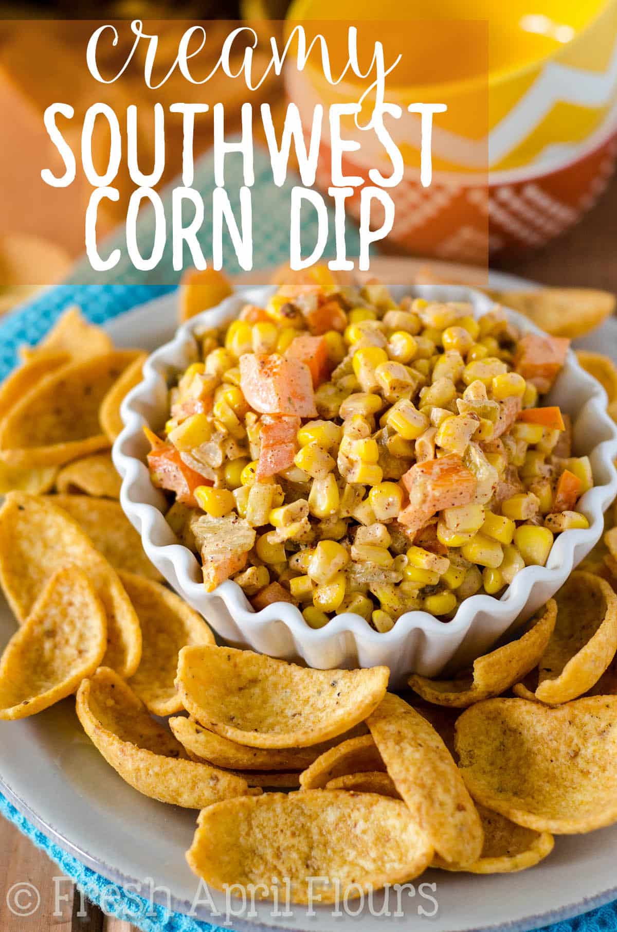 Creamy corn dip, loaded with crisp chiles and bell peppers and spiced with homemade taco seasoning. Great with corn or tortilla chips! via @frshaprilflours