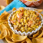 Creamy Southwest Con Dip: Lightened up creamy corn dip, spiced with homemade taco seasoning. Great with corn or tortilla chips!