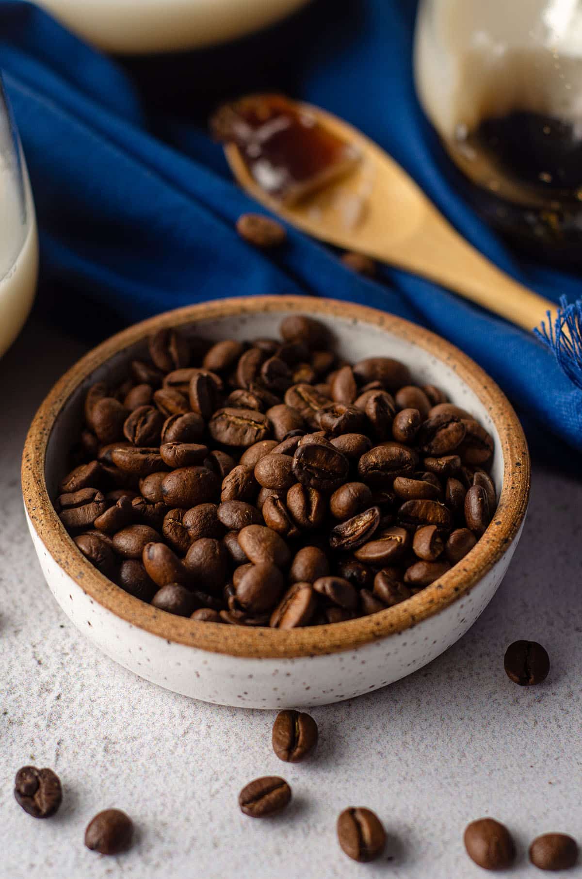 small pottery bowl of coffee beans