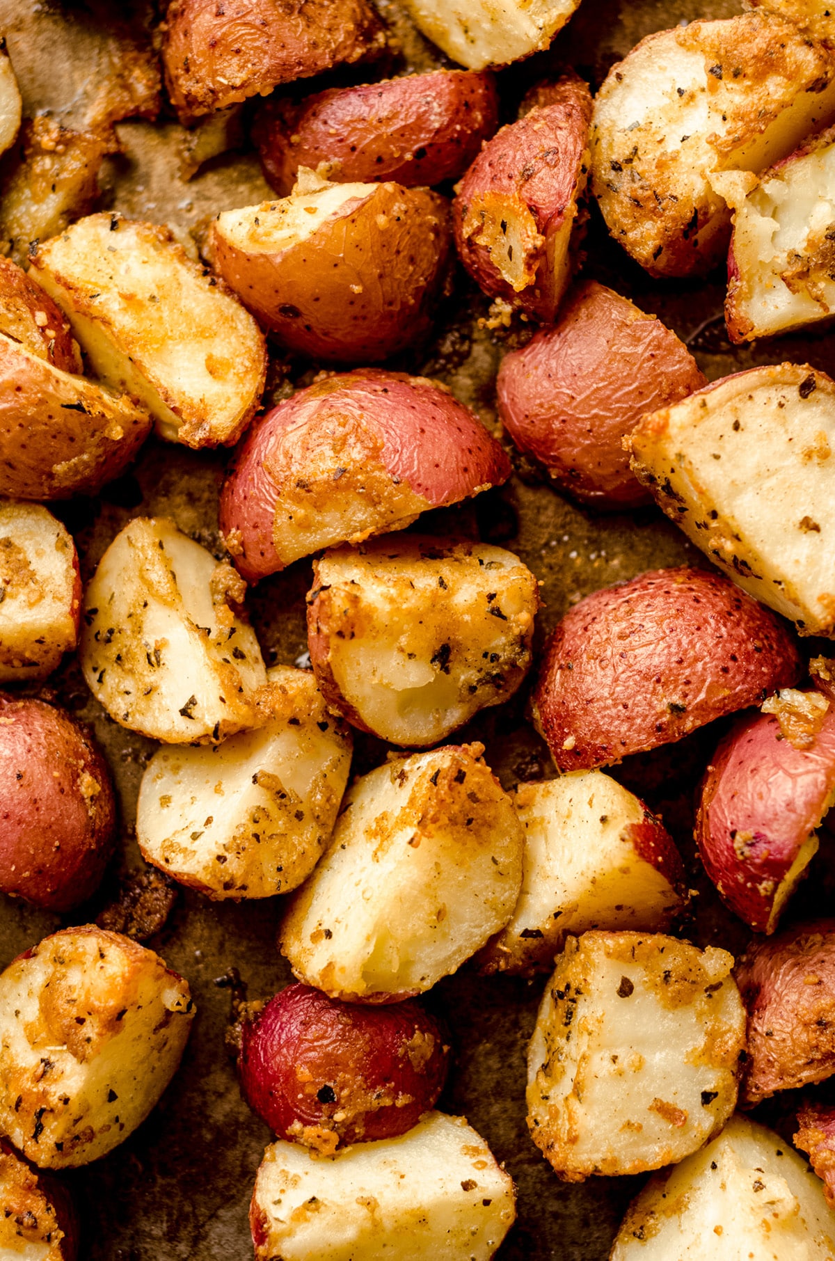 herbed red potatoes on a baking sheet