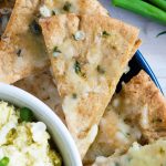 Homemade Cheese & Herb Pita Chips: Oven baked pita chips seasoned with parsley, chives, olive oil, and creamy herbed cheese.