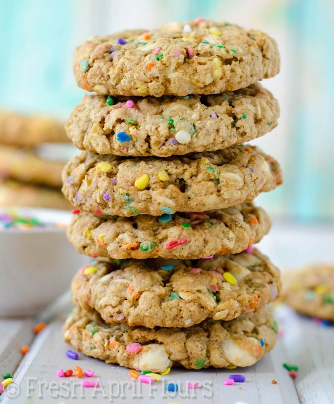 Funfetti White Chocolate Chip Oatmeal Cookies: Soft and chewy oatmeal cookies filled with white chocolate chips and plenty of sprinkles for celebrating any occasion!