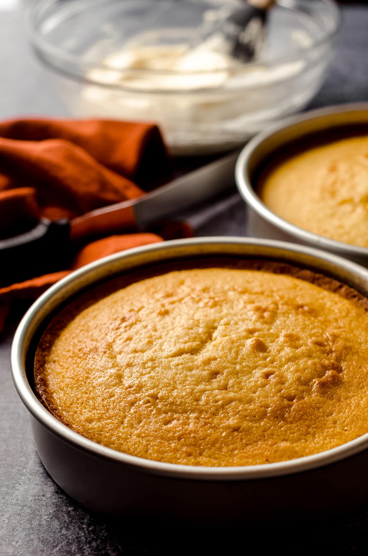 orange creamsicle layer cake baked in a baking pan