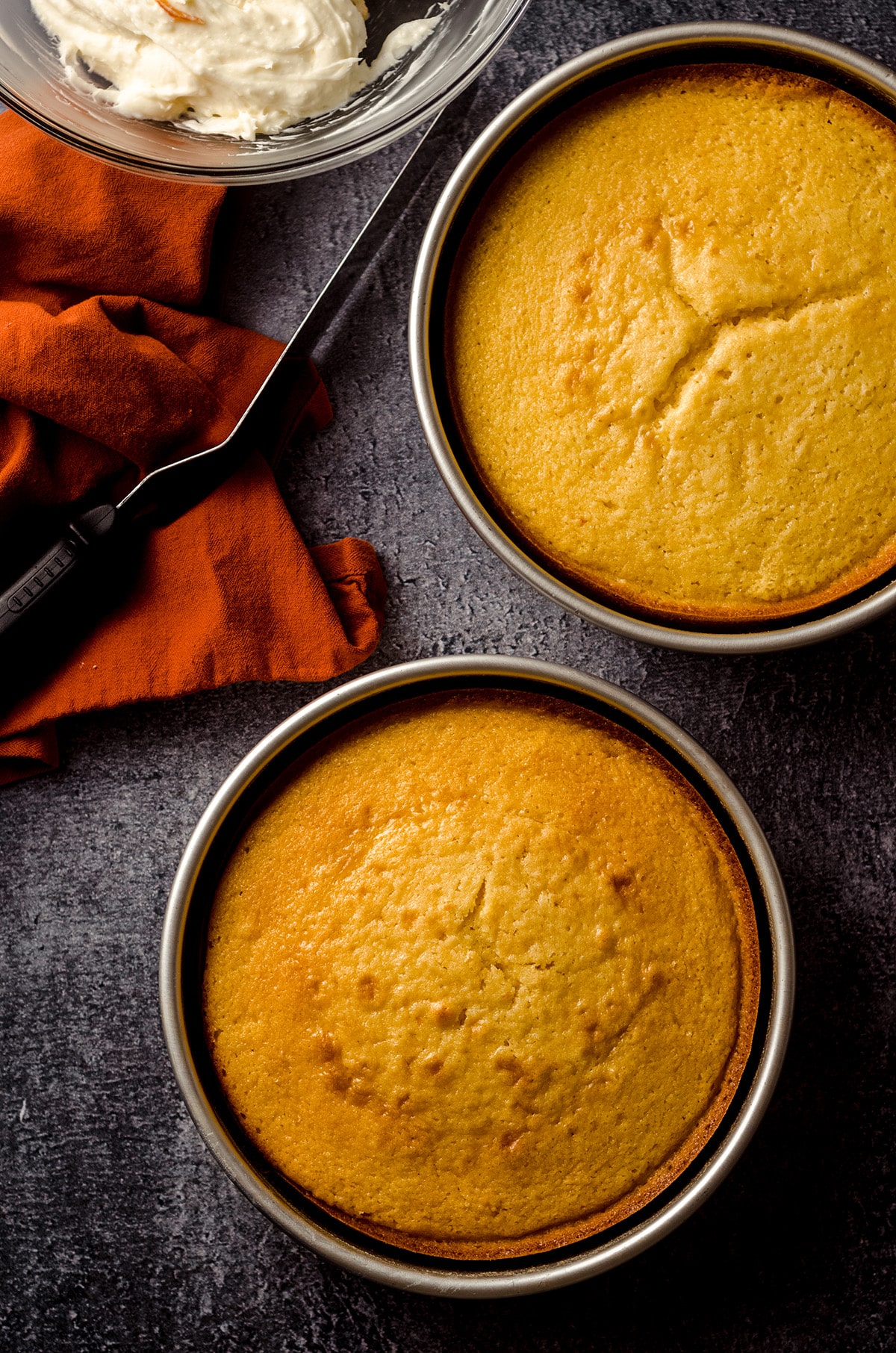 orange creamsicle layer cake baked in a baking pan