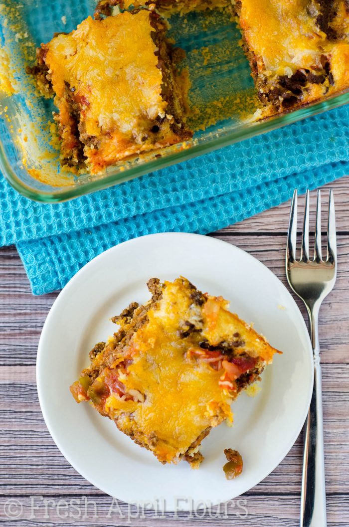 Baked Taco Casserole: An easy casserole layered with quick cornbread, seasoned meat, salsa, and cheese. Perfect for a quick weeknight meal and makes great leftovers!