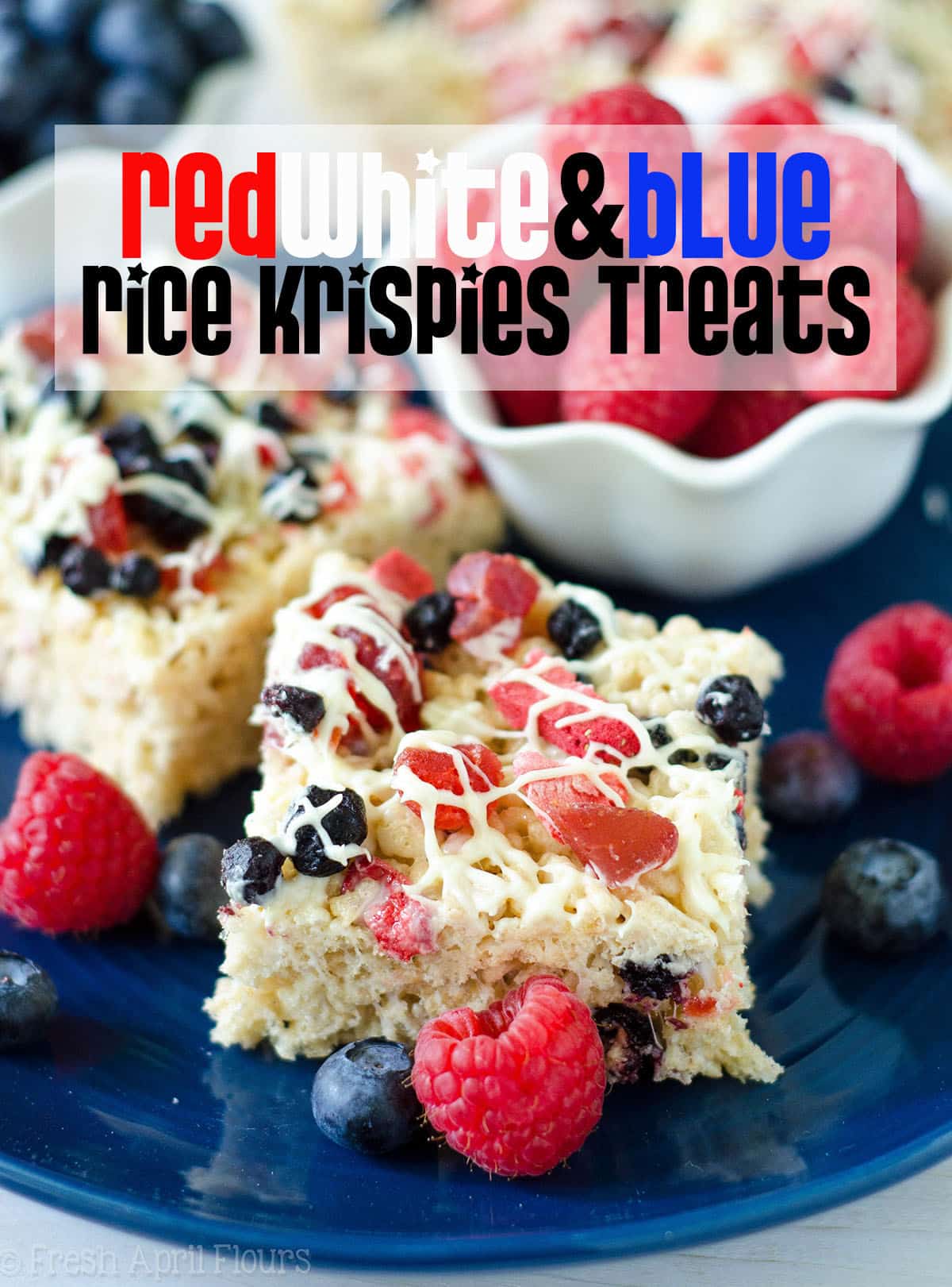 Red, White, & Blue Rice Krispies Treats: A patriotic twist on the classic featuring dried fruit and white chocolate-- use blueberries, strawberries, raspberries, and/or cherries for a berry version fit for any American celebration! via @frshaprilflours