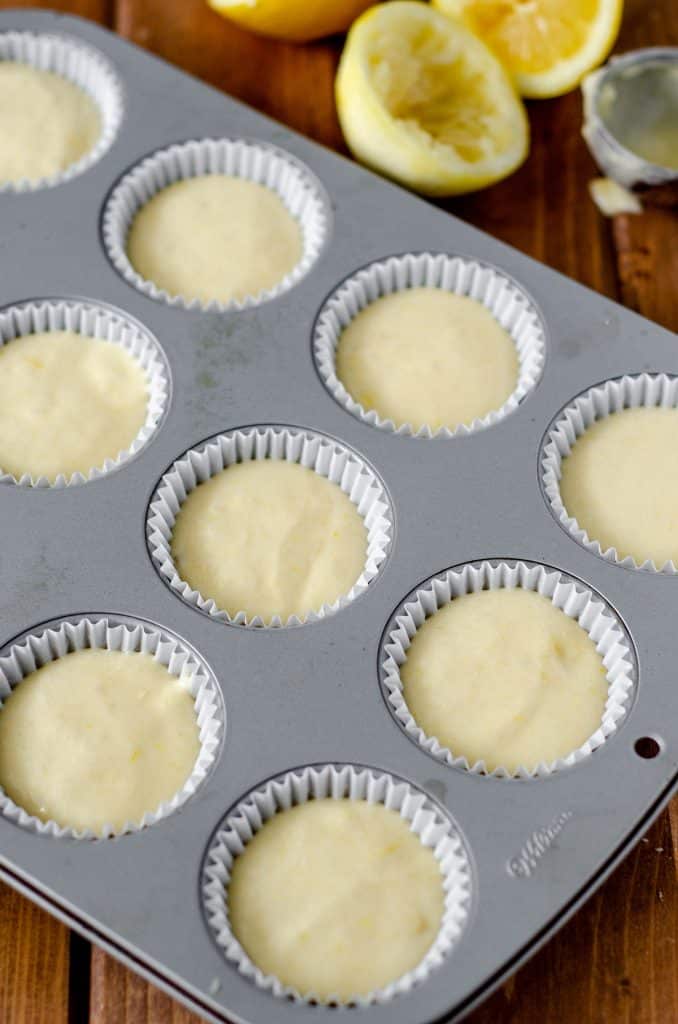 cupcake liners filled with lemon cupcake batter