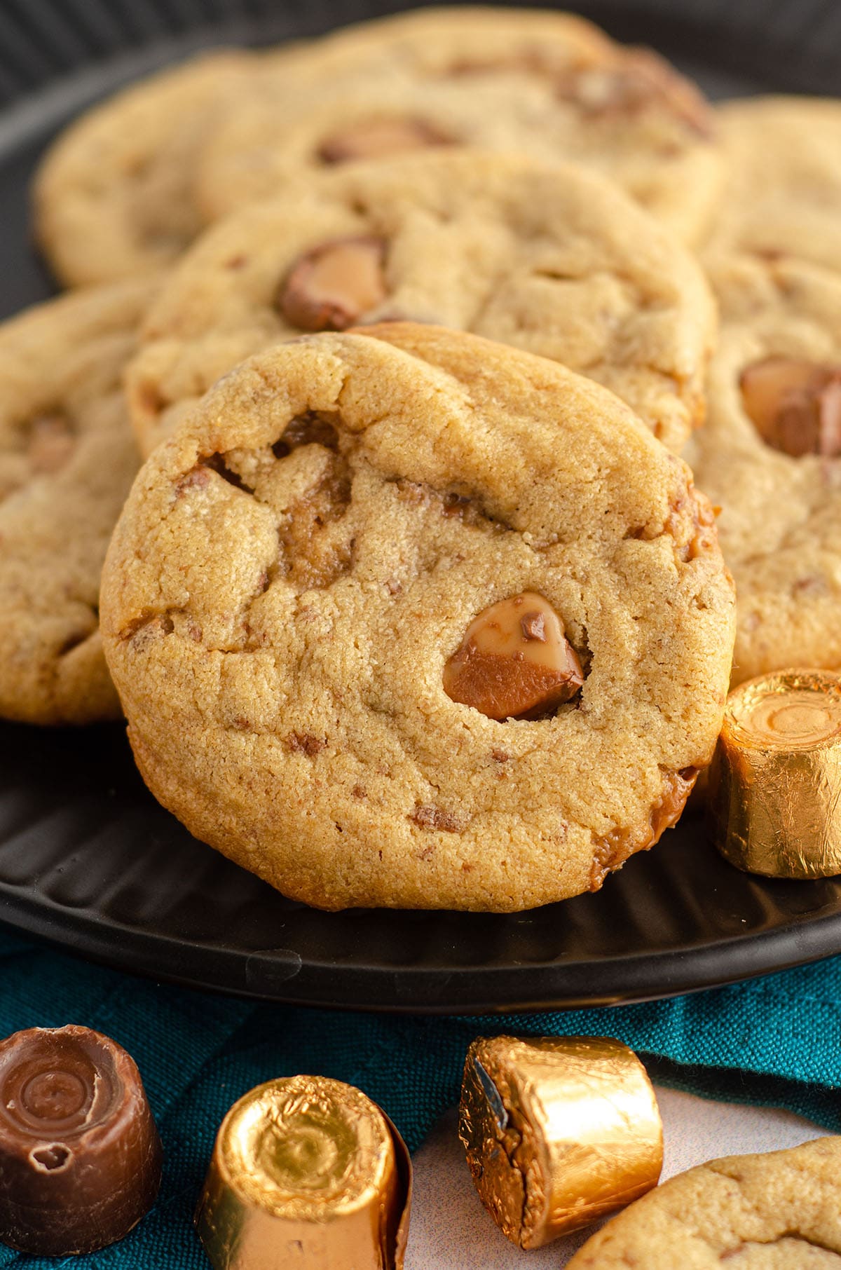 peanut butter rolo cookies on a black plate