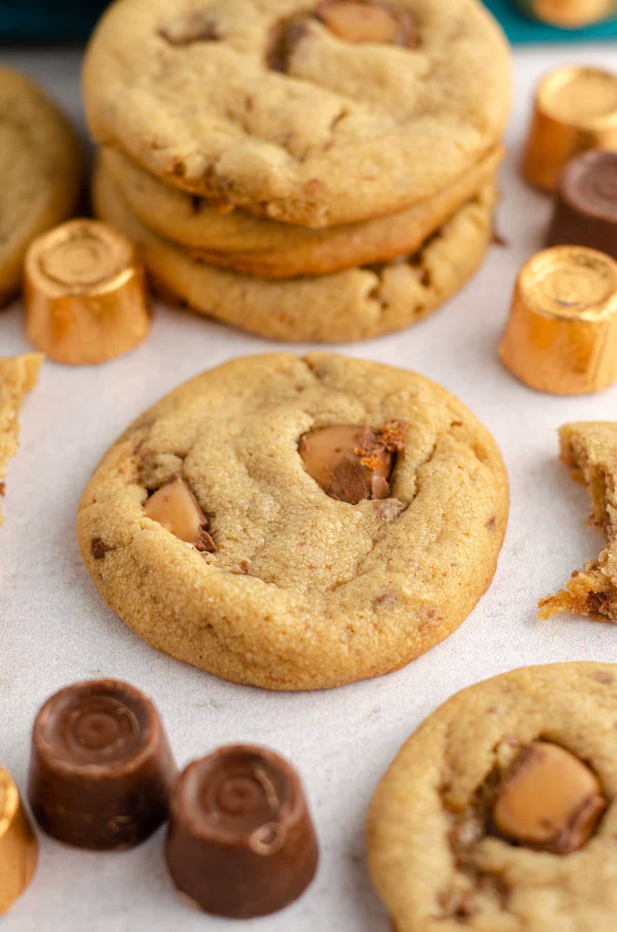 peanut butter rolo cookies surrounded by rolos