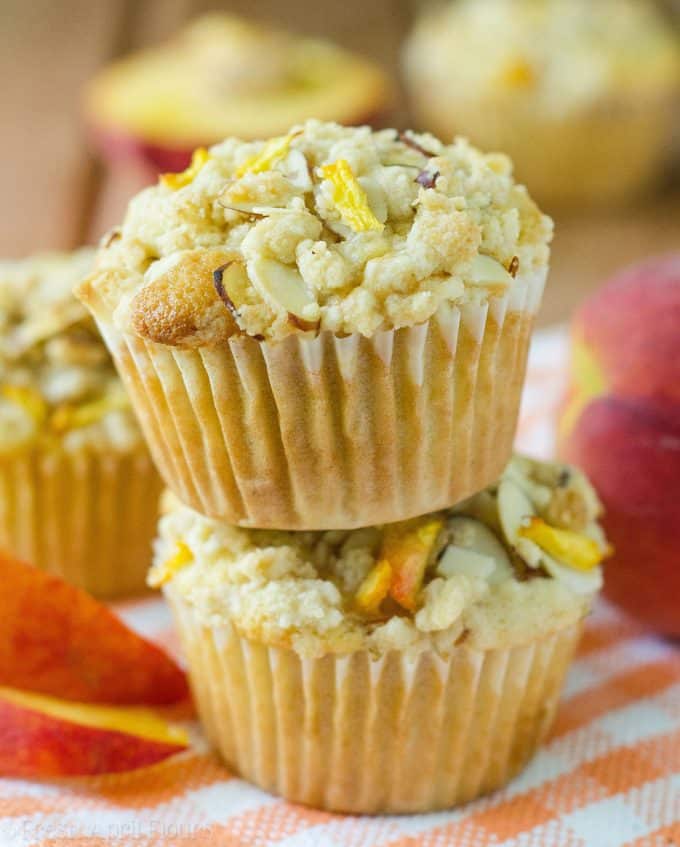 Peach Almond Streusel Muffins: Moist and tender peach muffins, accented with almond extract and topped with a sweet and crunchy almond streusel.