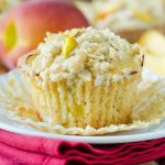 Peach Almond Streusel Muffins: Moist and tender peach muffins, accented with almond extract and topped with a sweet and crunchy almond streusel.