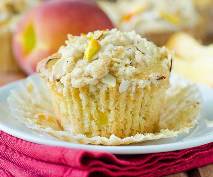 Peach Almond Streusel Muffins: Moist and tender peach muffins, accented with almond extract and topped with a sweet and crunchy almond streusel.