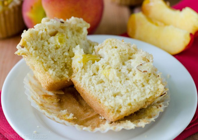 Peach Almond Streusel Muffins: Moist and tender peach muffins, accented with almond extract and topped with a sweet and crunchy almond streusel.