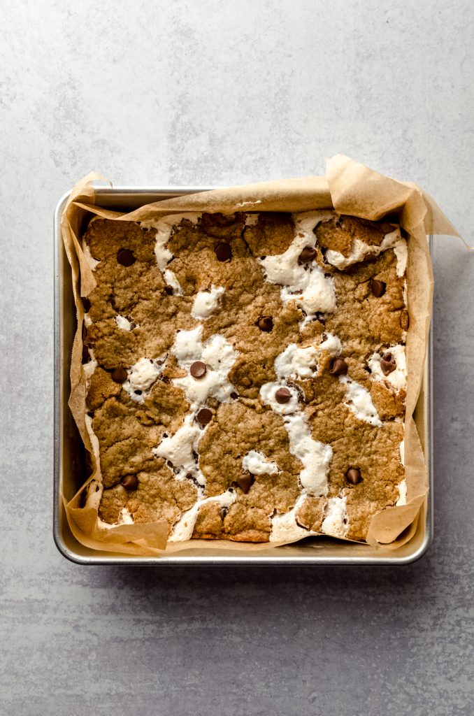 Aerial photo of s'mores bars in a pan ready to be sliced.