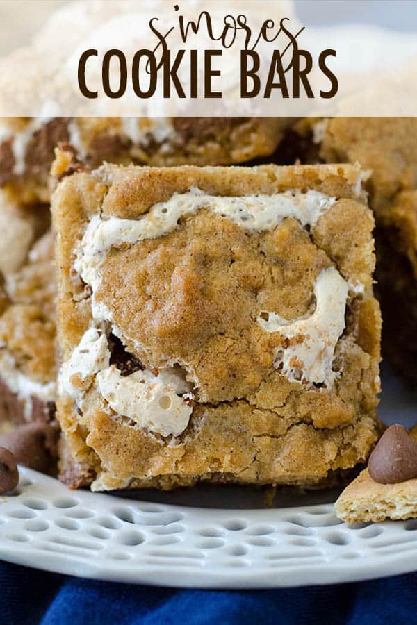 Soft and chewy graham cookie bars filled with a fluffy layer of marshmallow creme and milk chocolate chips. All the s'more without the flame! via @frshaprilflours