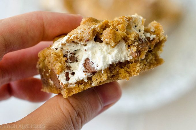 S'mores Chewy Cookie Bars: Soft and chewy graham cookie bars filled with a fluffy layer of marshmallow creme and milk chocolate chips. All the s'more without the flame!