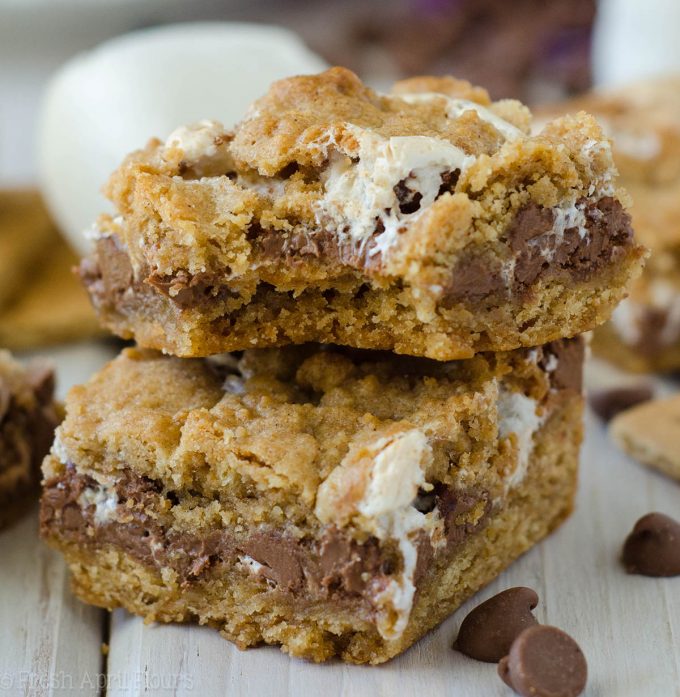 S'mores Chewy Cookie Bars: Soft and chewy graham cookie bars filled with a fluffy layer of marshmallow creme and milk chocolate chips. All the s'more without the flame!