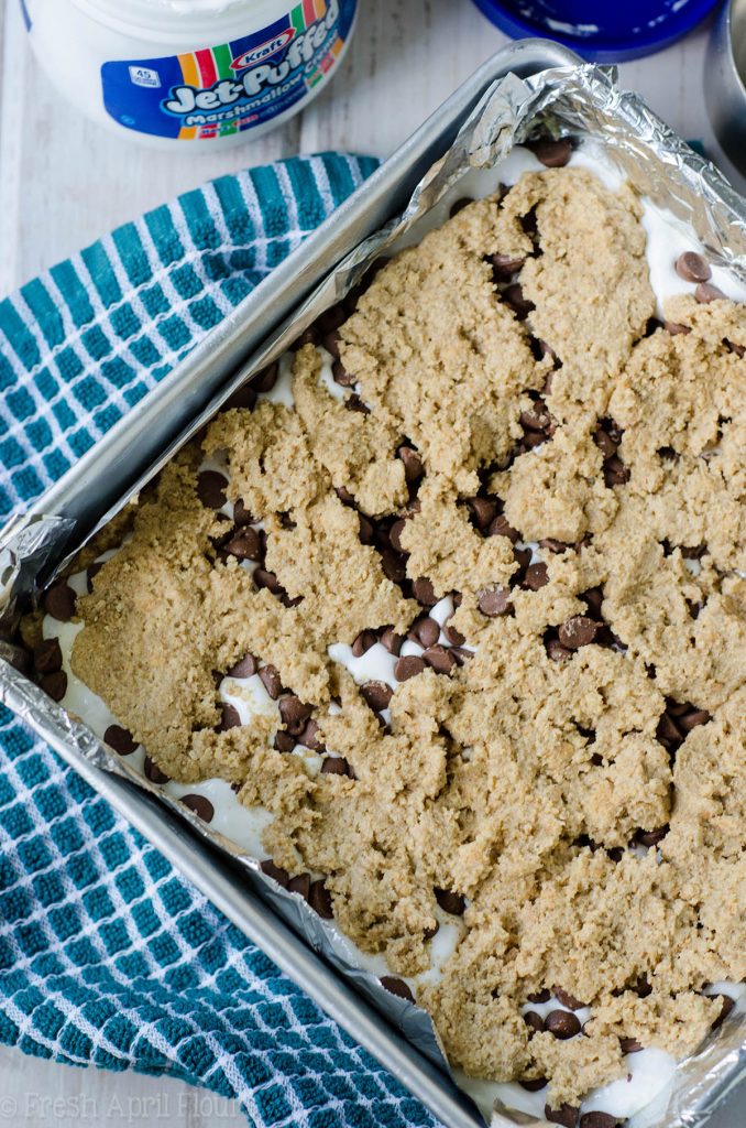 S'mores Chewy Cookie Bars: Soft and chewy graham cookie bars filled with a fluffy layer of marshmallow creme and milk chocolate chips. All the s'more without the flame!