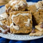 S'mores Chewy Cookie Bars: Soft and chewy graham cookie bars filled with a fluffy layer of marshmallow creme and milk chocolate chips. All the s'more without the flame!