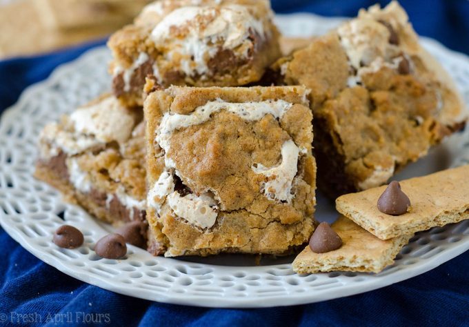 S'mores Chewy Cookie Bars: Soft and chewy graham cookie bars filled with a fluffy layer of marshmallow creme and milk chocolate chips. All the s'more without the flame!